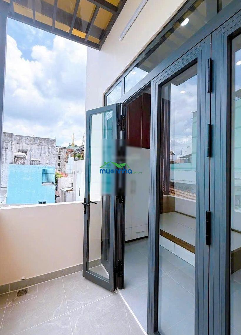 Bán nhà mới xây 4 tấm quận 4 có thang máy mặt tiền xóm chiếu cách 20m giá 12 tỉ 5 tl 6pn 7wc gần q1