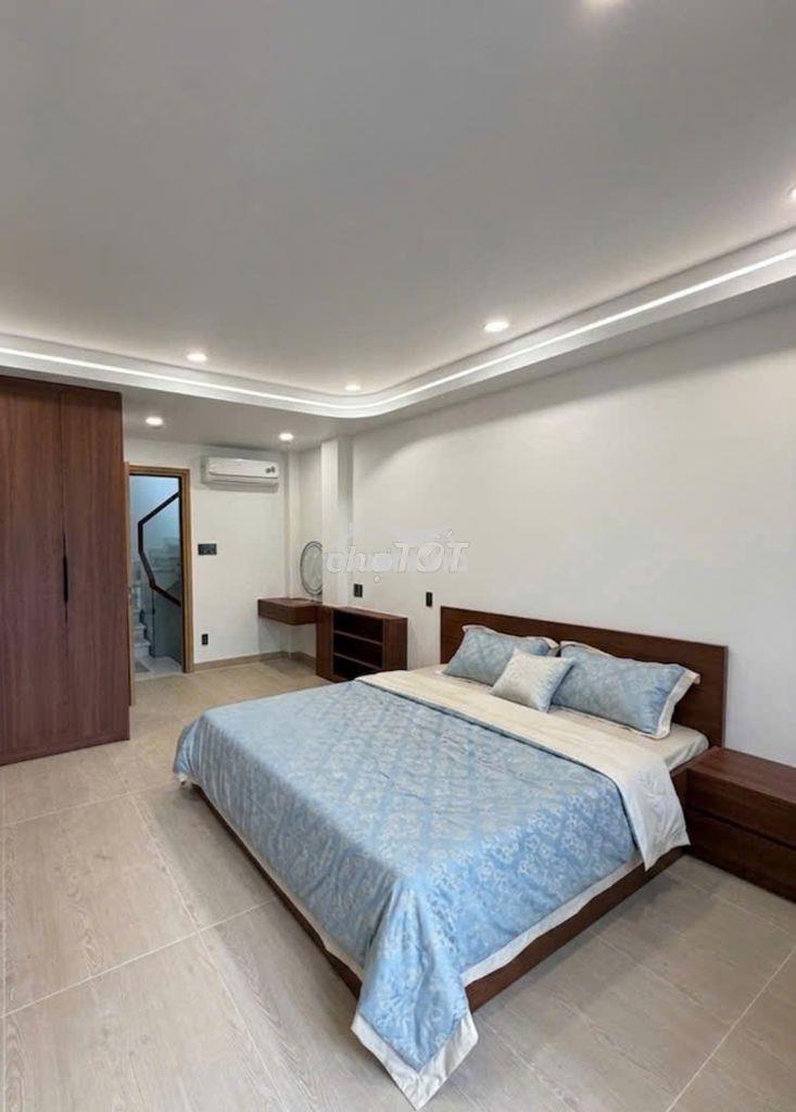 Nhà đẹp 4t x 80m2 - xe hơi đậu cửa, mới, nội thất vip ra bùi đình túy. - 4