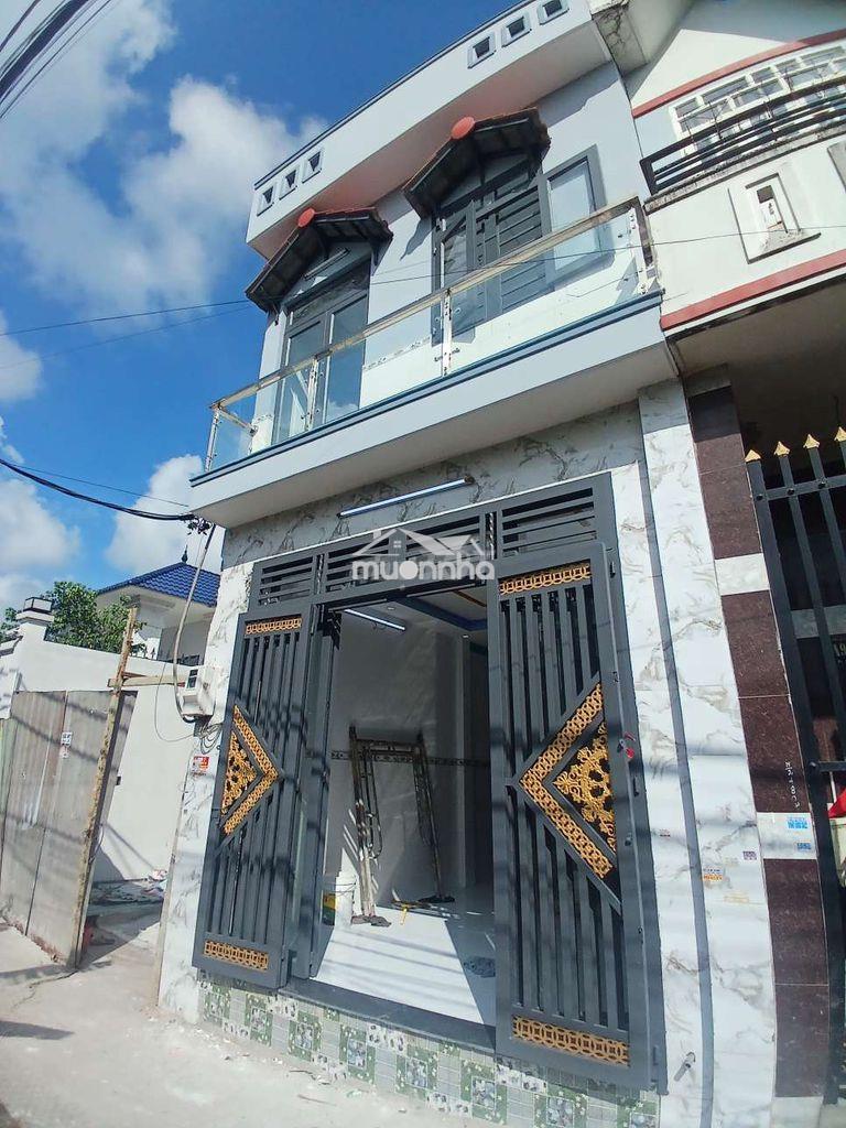 Bán nhà ngay chợ 1a khu dân cư hiện hữu dtsd: 63m2 1t+ lầu 2pn 2w