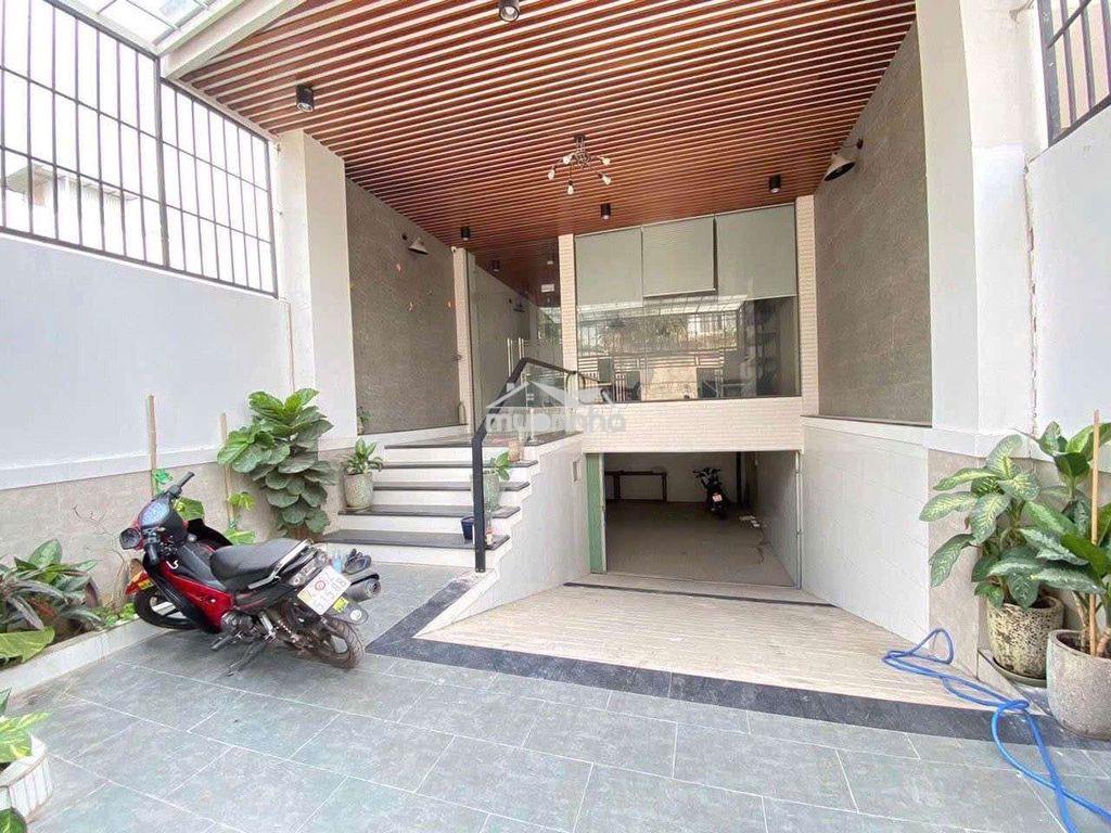 👉Toà nhà hầm + 5 tầng ngay ngã 4 bình phước - 2