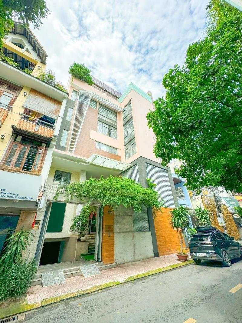 Tòa nhà  8 tầng - gần cổng t3 - lê văn huân - tân bình - dt: 12.5*16m (195m2) - 69 tỷ - 2