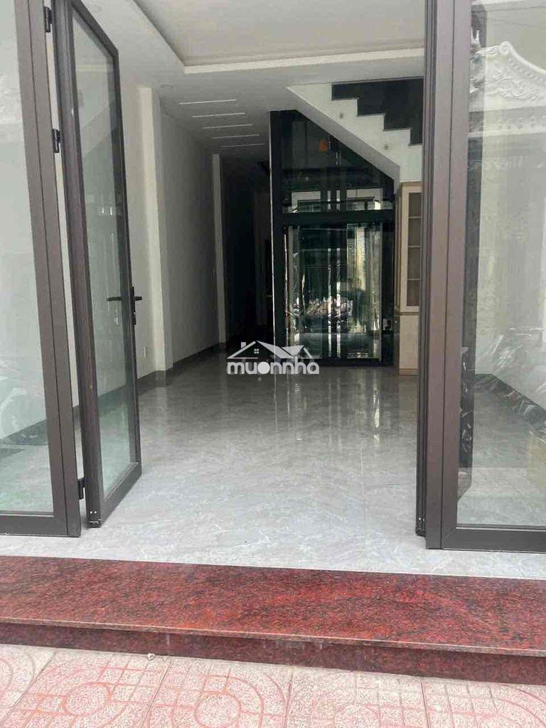 Nhà mới xây 100% 4lầu 5pn - có thang máy - 980 nguyễn duy trinh q9 - 2