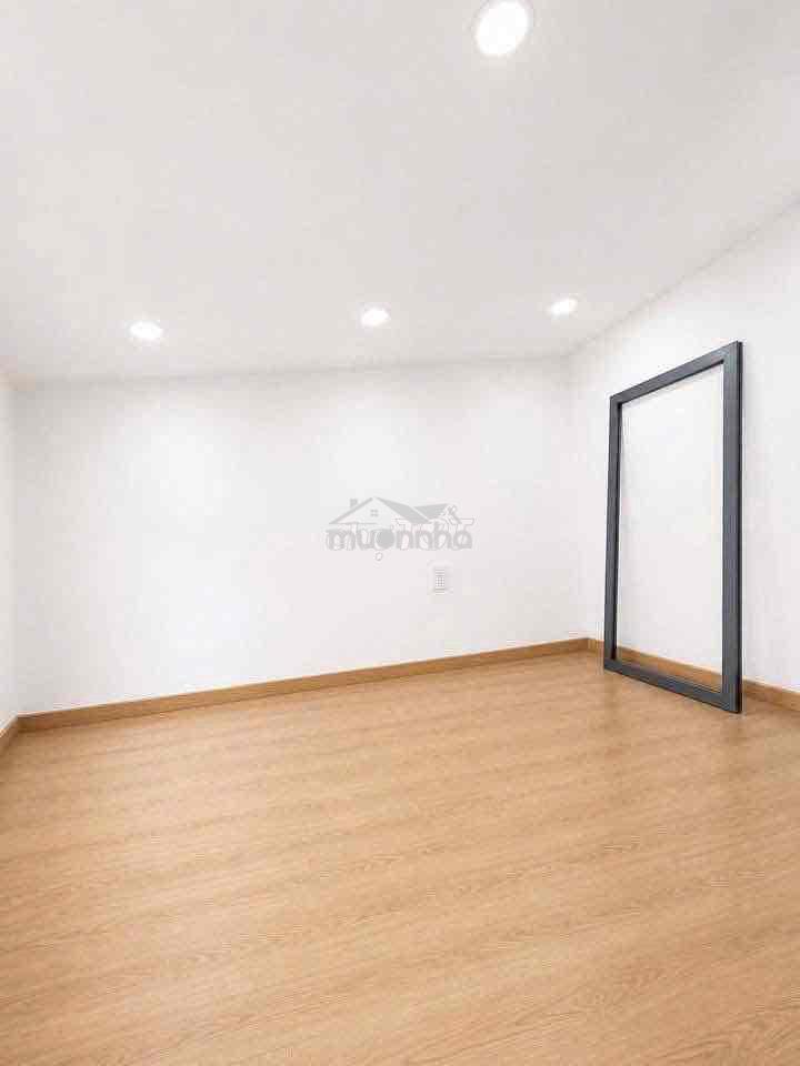 Nhà mới , trệt lầu lửng , sd 30m2 , trước nhà 3m , q4. - 3