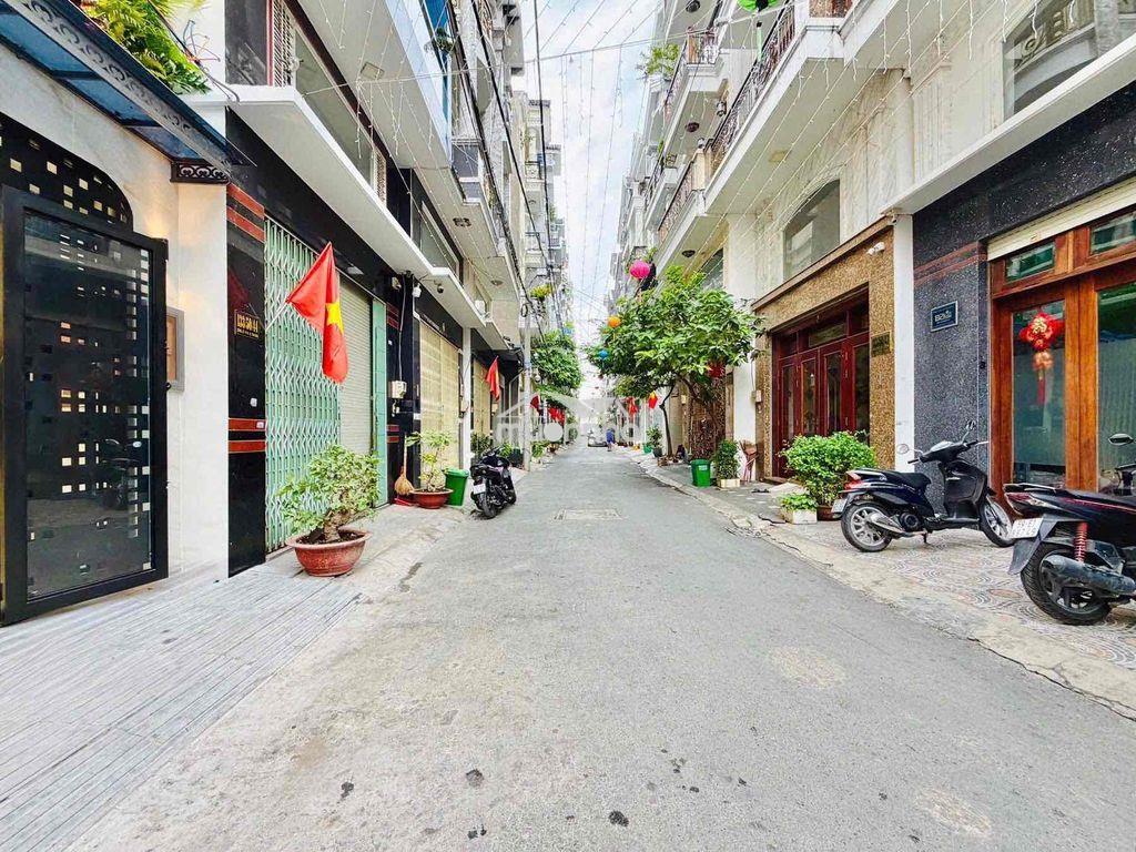 Nhà tân bình 4 phòng ngủ có thang máy - Ảnh 2